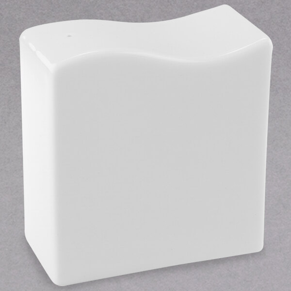 A white square Villeroy & Boch pepper shaker with a curved edge.
