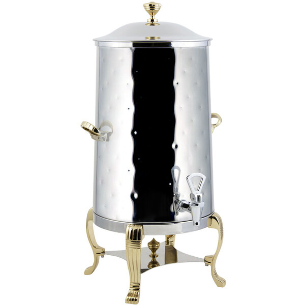 A Bon Chef stainless steel coffee chafer urn with brass trim.