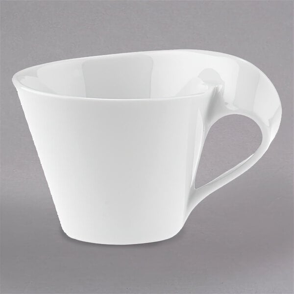 A white Villeroy & Boch porcelain cappuccino cup with a curved handle.