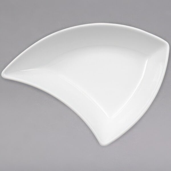 A Villeroy & Boch white porcelain bowl with a curved shape.