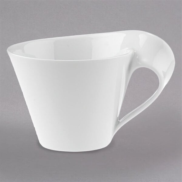 A white Villeroy & Boch NewWave coffee cup with a curved handle.