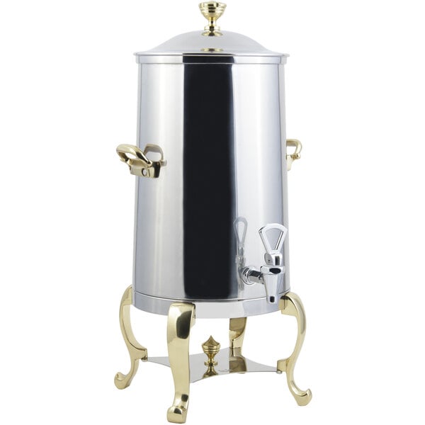 A Bon Chef stainless steel coffee chafer urn with brass trim.