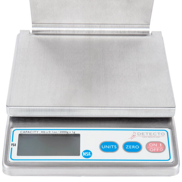 A silver Cardinal Detecto digital portion scale with a screen.