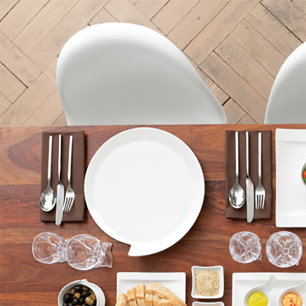 A close up of a Villeroy & Boch NewWave white porcelain plate.