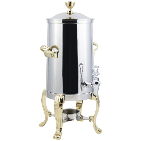 A Bon Chef stainless steel coffee chafer urn with brass trim.