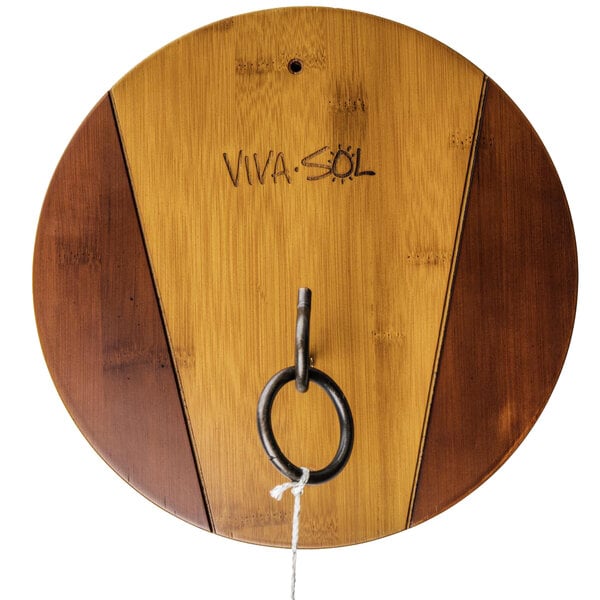 A wooden circle with a ring attached to it.