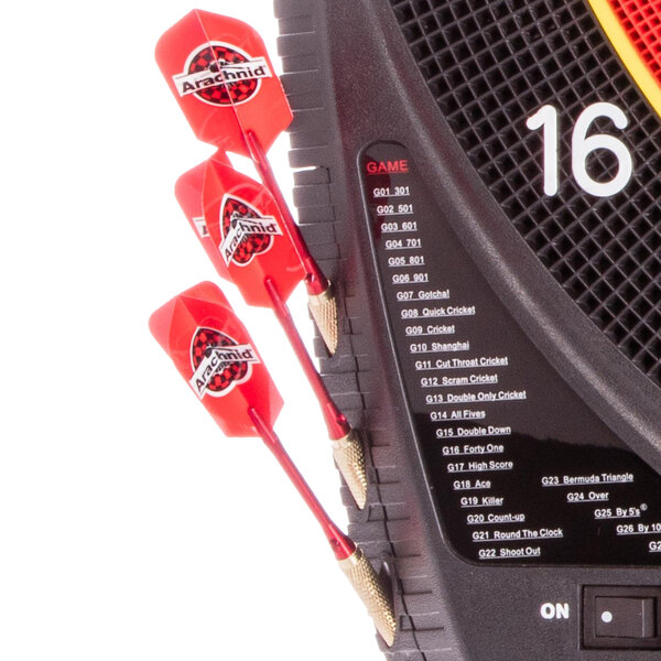 An Arachnid E520H electronic dartboard with red darts.
