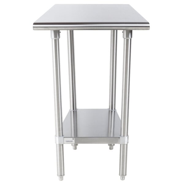 An Advance Tabco stainless steel work table with an undershelf.