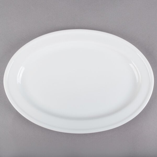 A white oval platter with a rim.