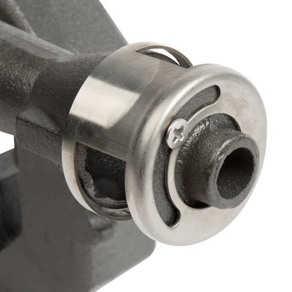 A Cooking Performance Group burner pipe with a metal cap.