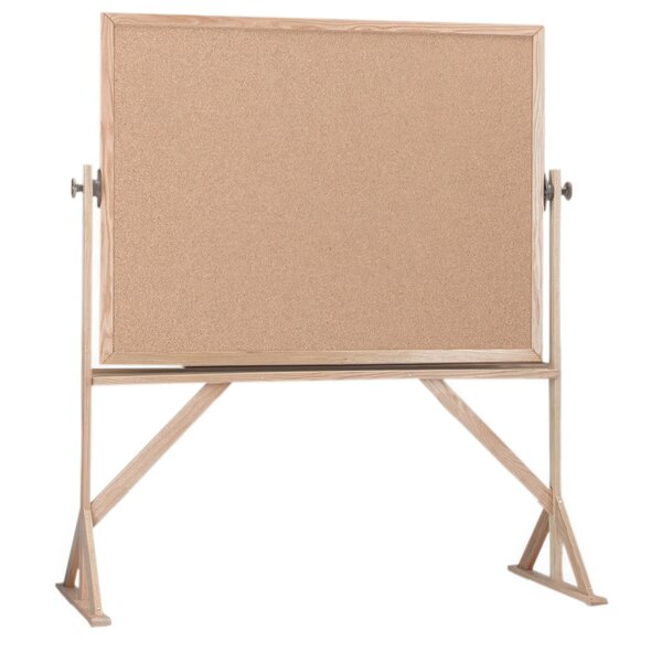 A white melamine and cork board on a wooden stand.