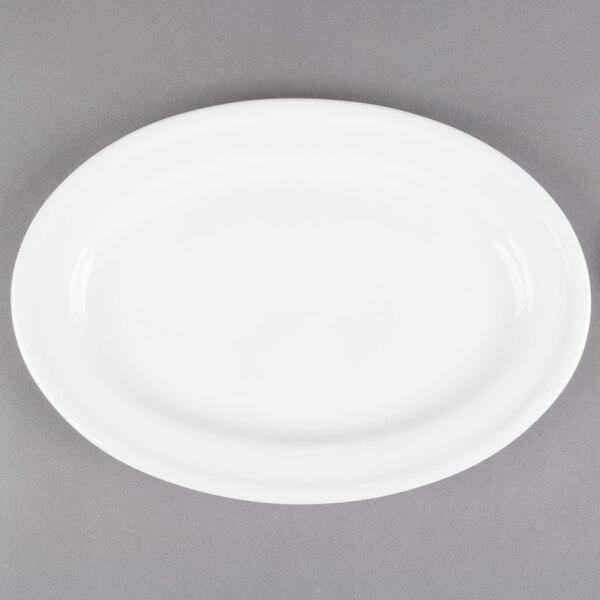 An Alpine White porcelain oval platter with a rim.
