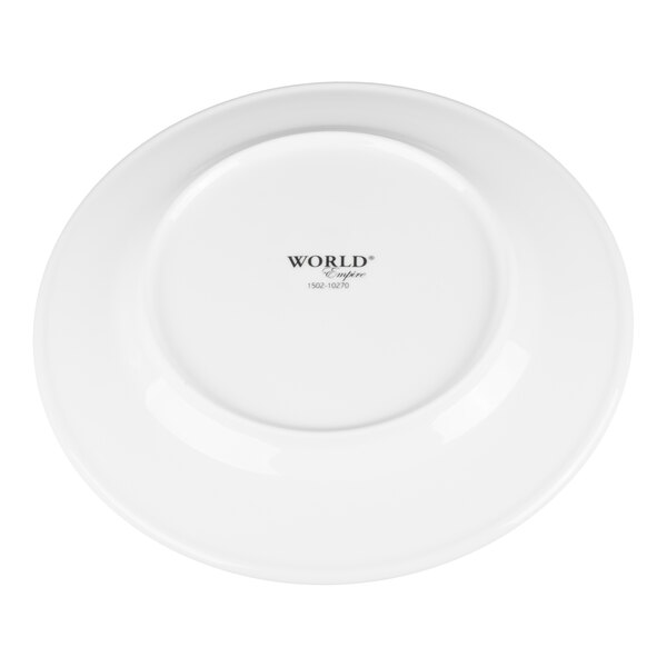 A white porcelain plate shown from the bottom with the text 'WORLD Empire' and some numbers printed in the center.