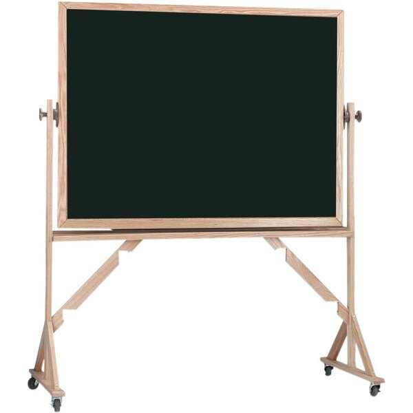 A blackboard with a reversible black and white background and a wooden stand.