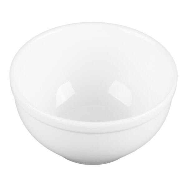 A plain, round, white bowl with a smooth, glossy finish.