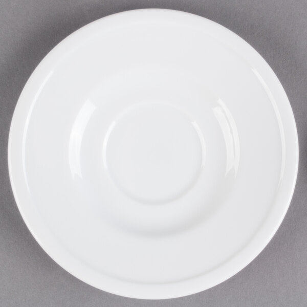 A Libbey Alpine White Porcelain Saucer with a circle in the center.