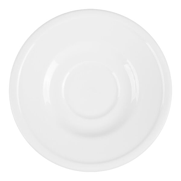 A round, white porcelain saucer with a central indentation, viewed from above.
