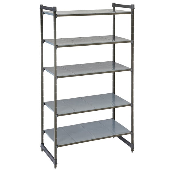 A grey metal Cambro Camshelving Basics Plus stationary unit with four shelves.