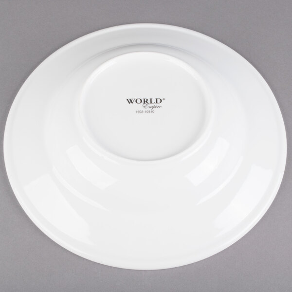 A white porcelain pasta bowl with a circular design that says "World" in black text.