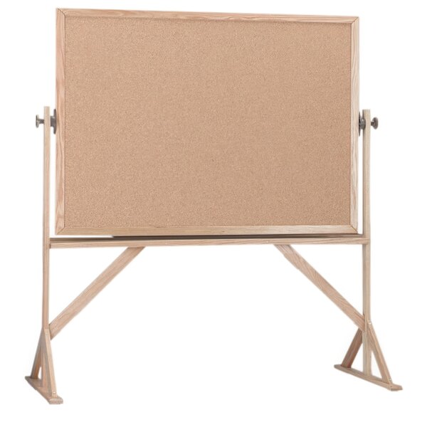 A wooden Aarco reversible free standing cork board.