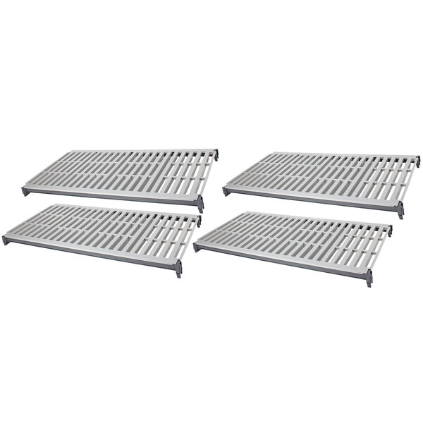 Four white metal shelves with white vented grates.