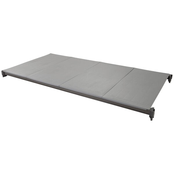 A grey metal Cambro Camshelving® Basics Plus shelf with wheels on a white background.