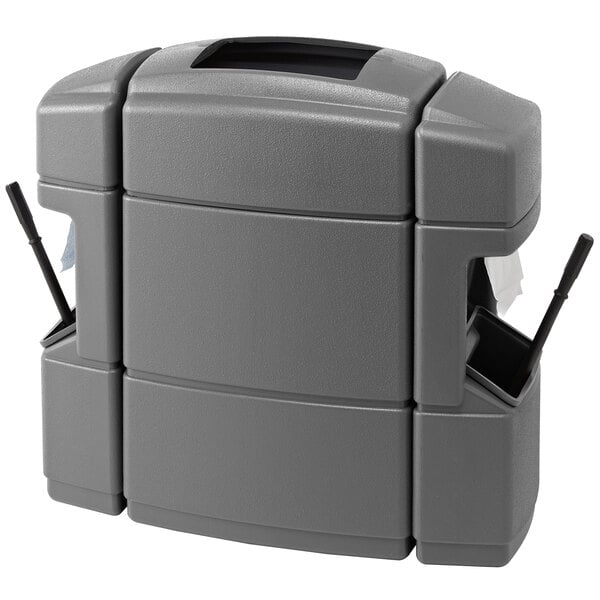 A dark gray rectangular Commercial Zone Islander waste container with paper towel dispensers, squeegees, and windshield wash stations.