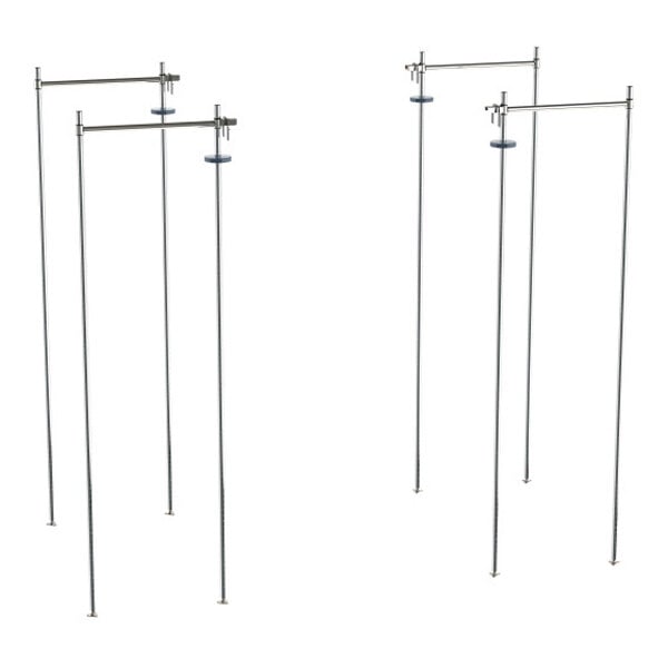 A set of chrome-plated stationary end shelving units with vertical and horizontal support bars.