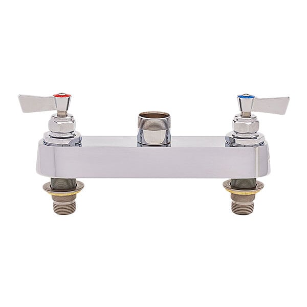 A Fisher brass faucet base with swivel stems and lever handles on a white surface.