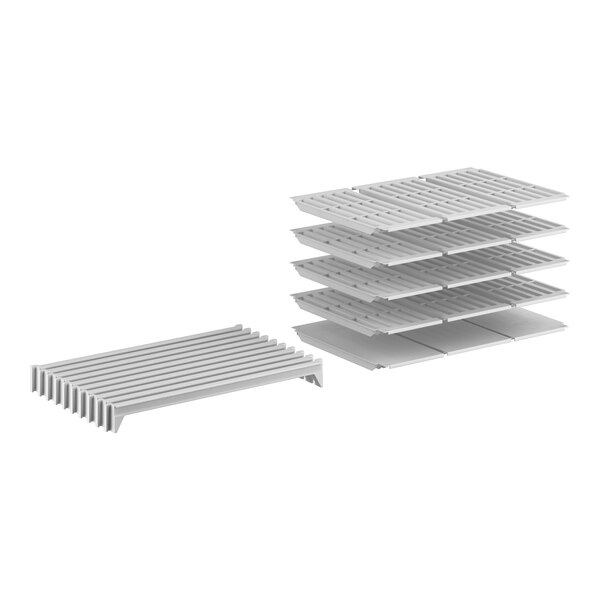 A white metal Cambro Camshelving Premium kit with 1 solid and 4 vented shelves.