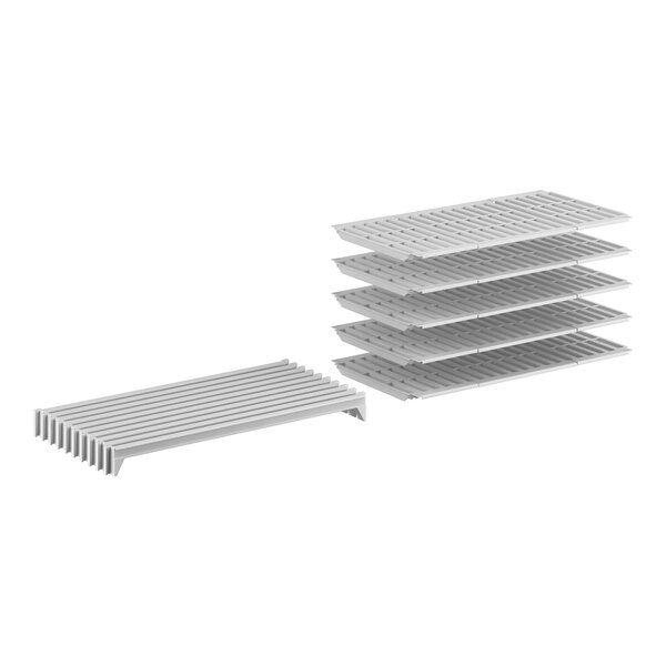A white Cambro Camshelving Premium shelf kit with several white plastic shelves.
