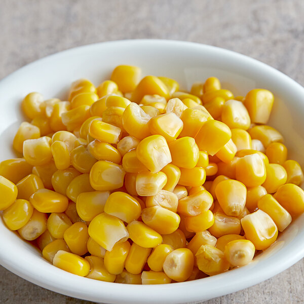 Regal Whole Kernel Sweet Corn in a white bowl.