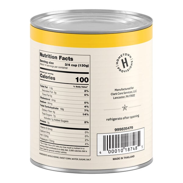 A large can with a yellow band at the top, displaying nutrition facts, a barcode, and product information on the label.