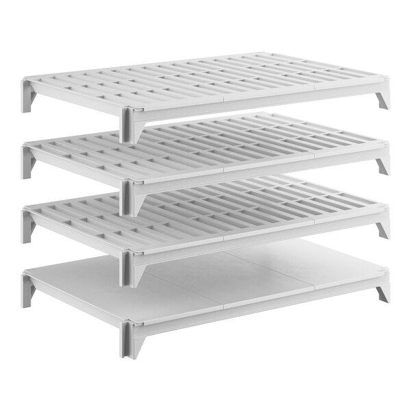 A set of four white shelving units, including one solid shelf and three vented shelves, designed for modular storage.