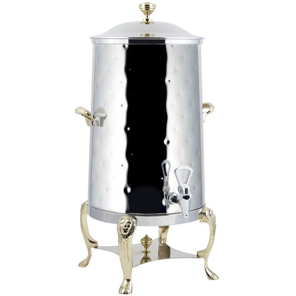 A Bon Chef stainless steel coffee chafer urn with brass trim and a lid.