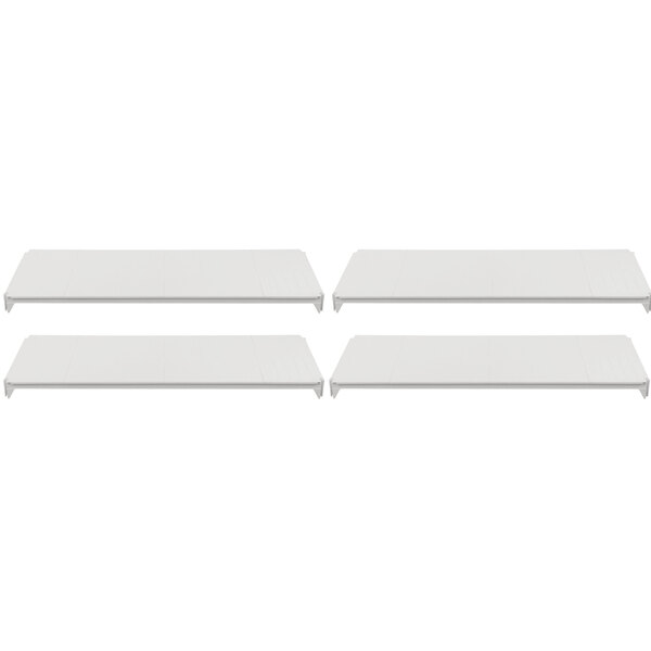 A row of three white rectangular Camshelving® shelves.