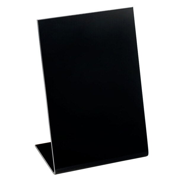 A black rectangular sign on a black stand.