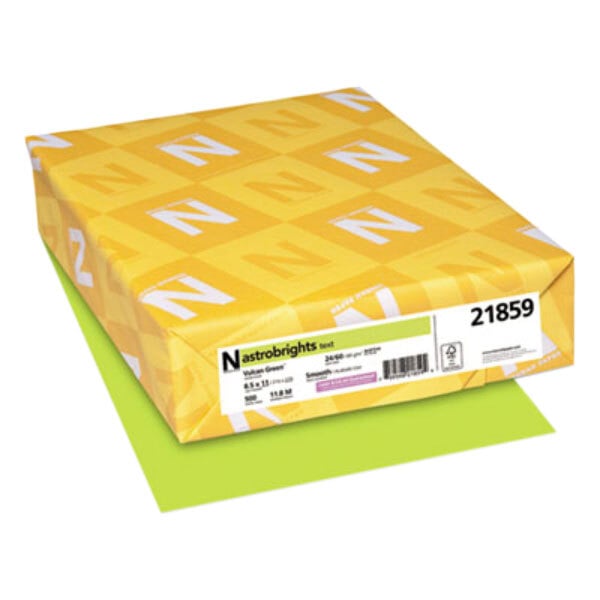 A yellow box of Astrobrights Vulcan Green color paper with white and yellow designs.