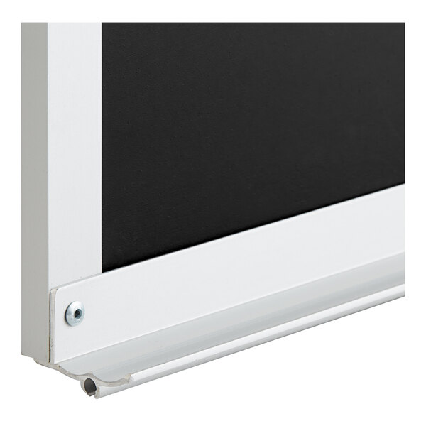 A black slate chalkboard with a white aluminum frame.
