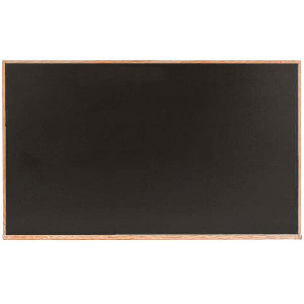 A black chalkboard with a solid oak wood frame.