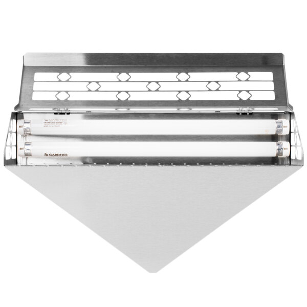 A stainless steel wall sconce with a white triangular object with a black border.