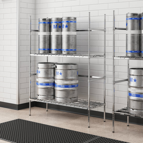 A Regency chrome metal shelf with kegs on it.