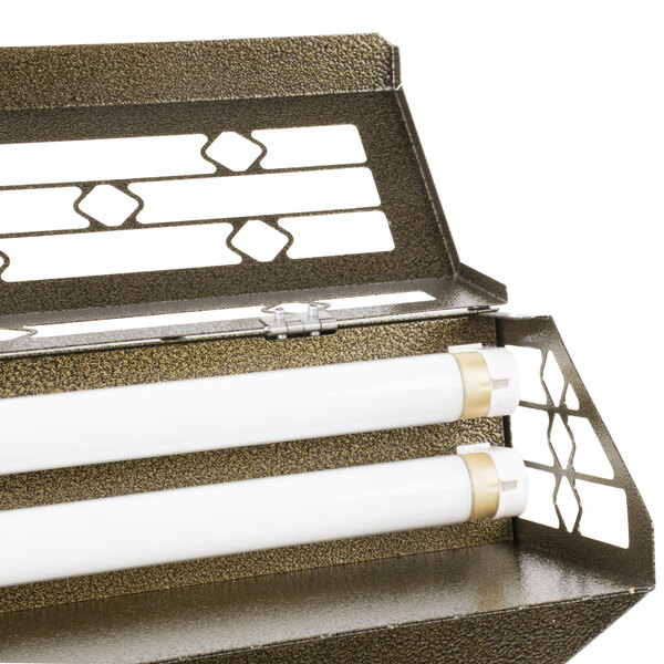 A Curtron gold metal wall sconce with a light and two tubes.