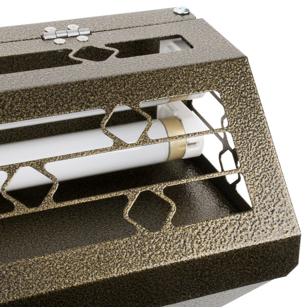 A metal box with a light inside and white tube.