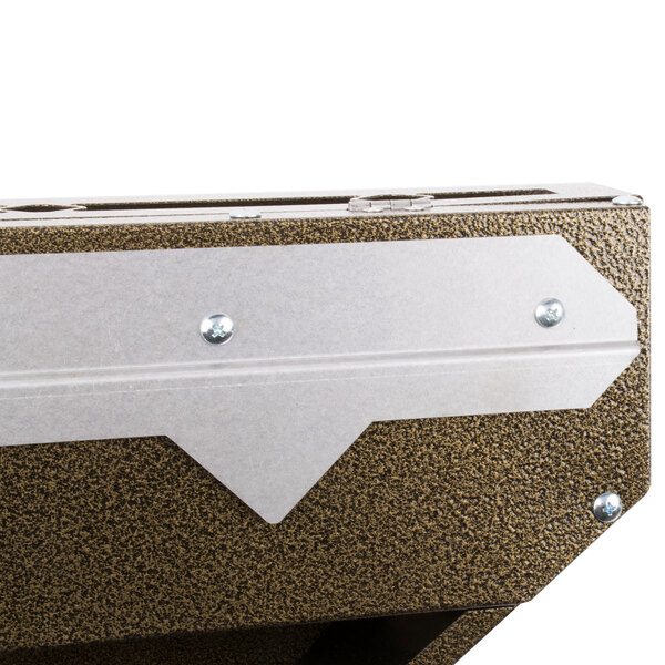 A close-up of a brown metal Curtron insect trap box with a silver strip on white paper.