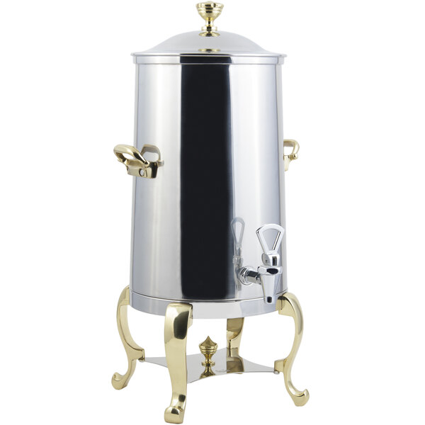 A stainless steel Bon Chef coffee chafer urn with brass trim.