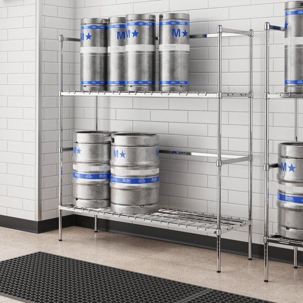 A Regency chrome metal keg rack holding six kegs.