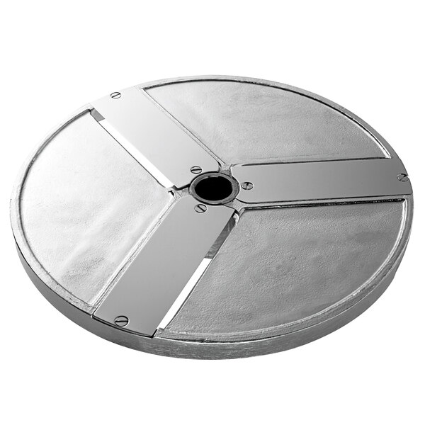 A circular metal plate with four holes.