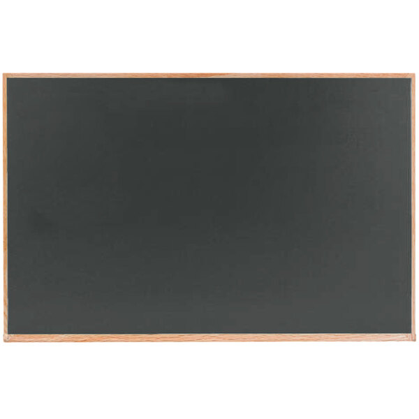 A blackboard with a slate gray solid oak wood frame.