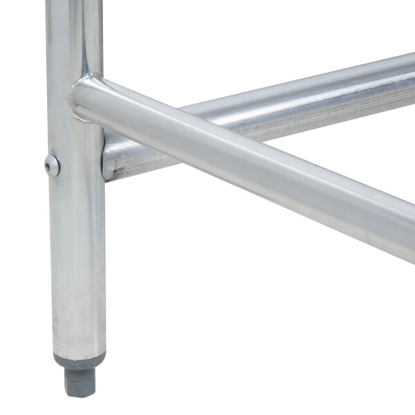 A metal table frame with a metal base.